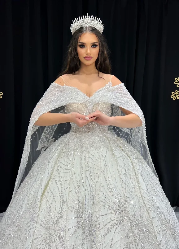 Catherine Sparkling Design and an Extravagant Cape Bridal Dress